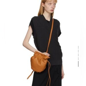 LEMAIRE orange glove bag